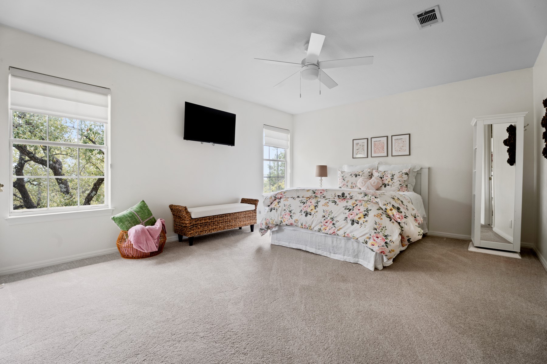 102 Hurst Creek Road Lakeway, TX 78734 - Photo 24 of 29 a bedroom with a bed and a couch