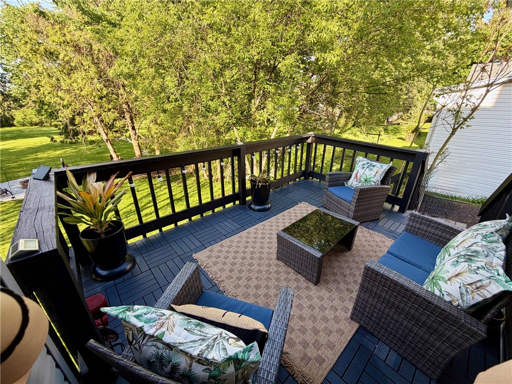 2048 Ridge Road Ontario, NY 14519 - Photo 23 of 47 Deck with roll up awning