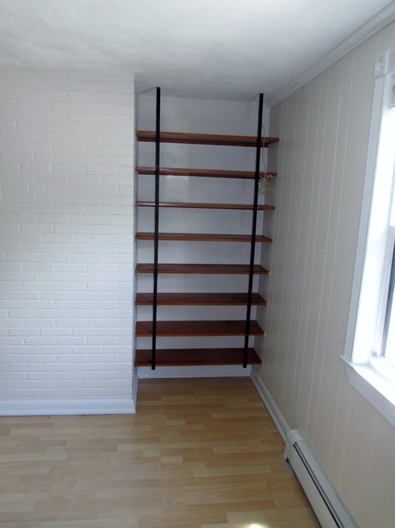 1247 Trapelo Road Waltham, MA 02451 - Photo 14 of 28 a view of a room with stairs and a window