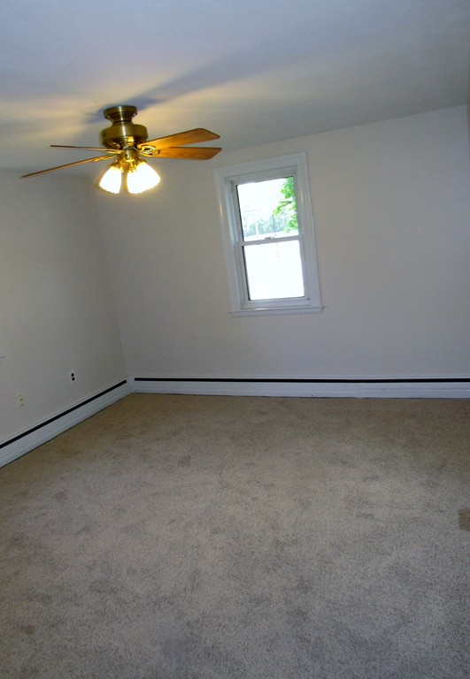 1247 Trapelo Road Waltham, MA 02451 - Photo 16 of 28 an empty room with a window