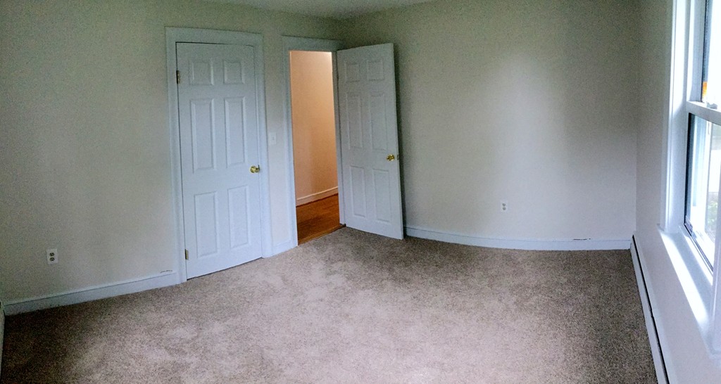 1247 Trapelo Road Waltham, MA 02451 - Photo 18 of 28 an empty room with windows