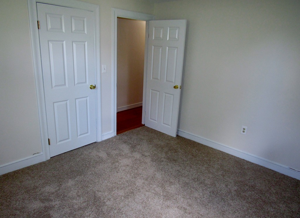1247 Trapelo Road Waltham, MA 02451 - Photo 20 of 28 an empty room with closet area