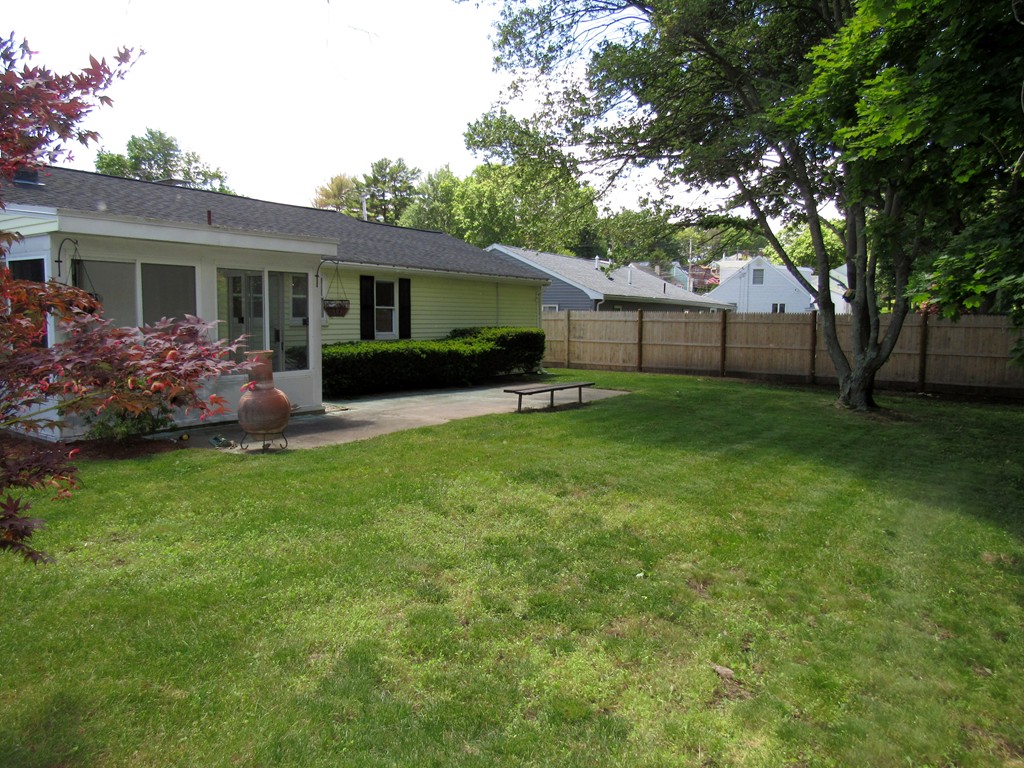 1247 Trapelo Road Waltham, MA 02451 - Photo 26 of 28 a front view of house with yard and green space