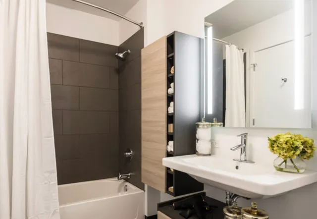 a bathroom with a bathtub and a sink