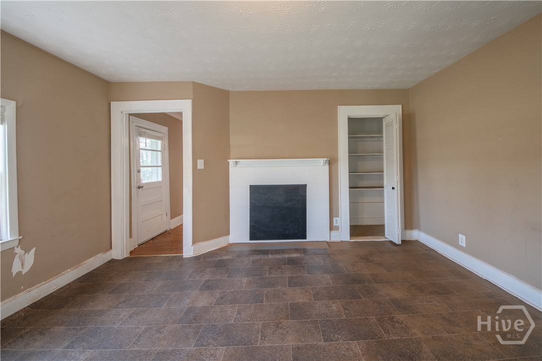 1080 Belmont Road Athens, GA 30605 - Photo 9 of 27 Kitchen Pantry and Decorative Fireplace
