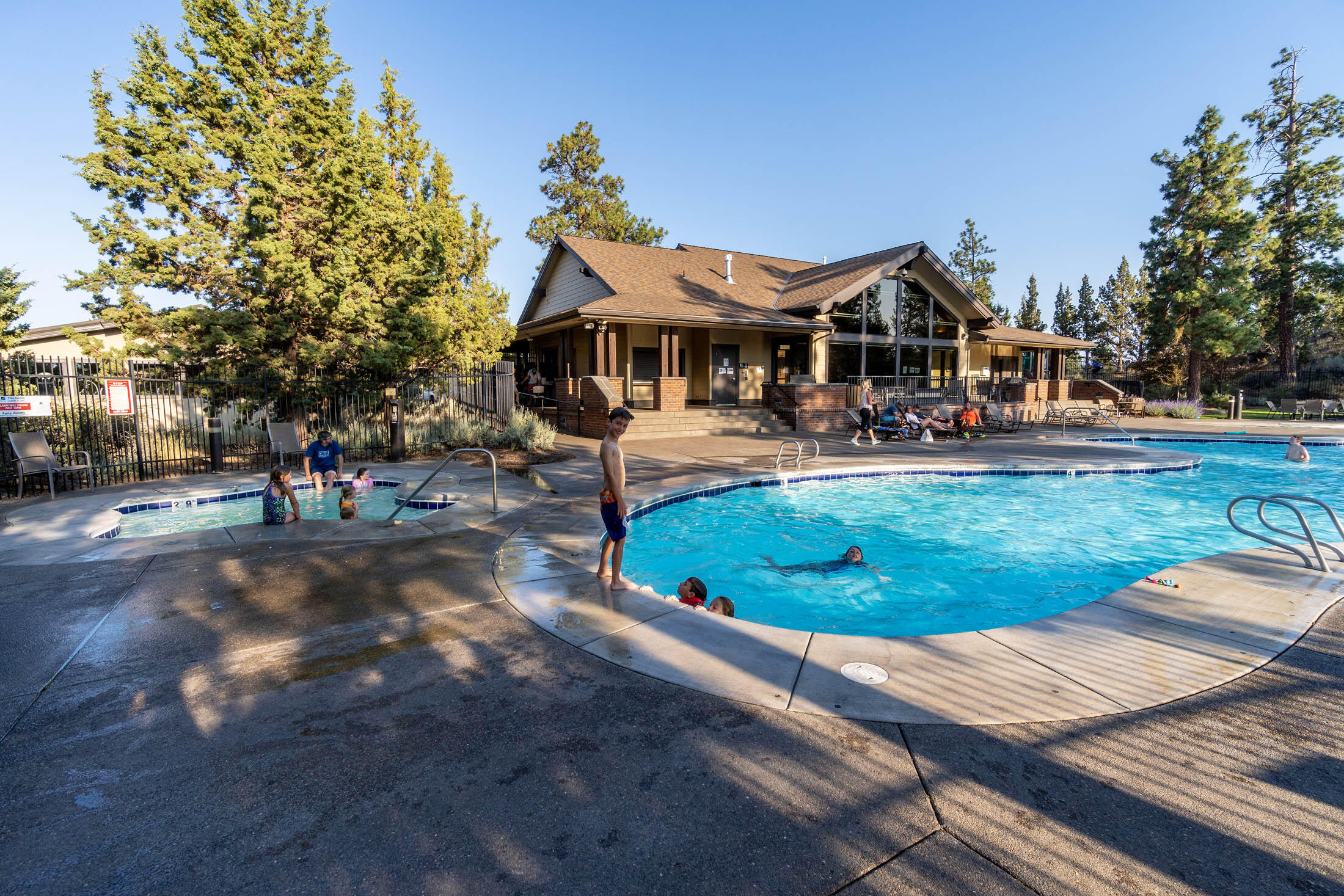61129 Manhae Loop Bend, OR 97702 - Photo 40 of 44 Community photo, shared amenities. Pool area view to club house.