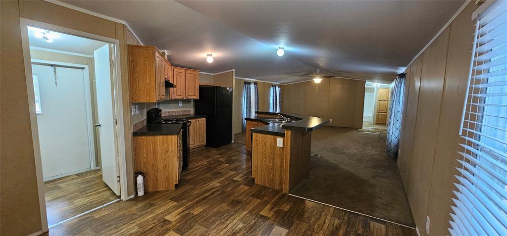 434 Geronimo Quitman, TX 75783 - Photo 14 of 36 a view of a gallery with wooden floor