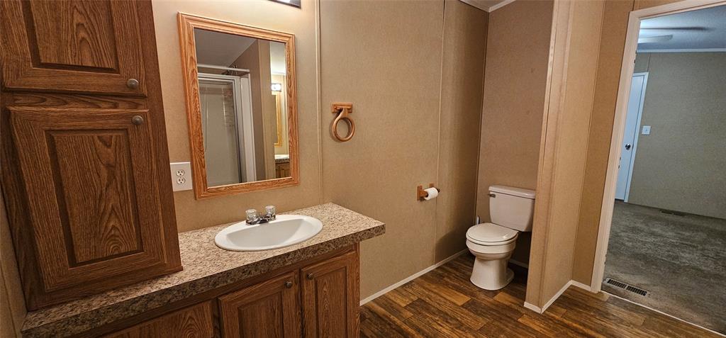 434 Geronimo Quitman, TX 75783 - Photo 20 of 36 a bathroom with a sink toilet and shower
