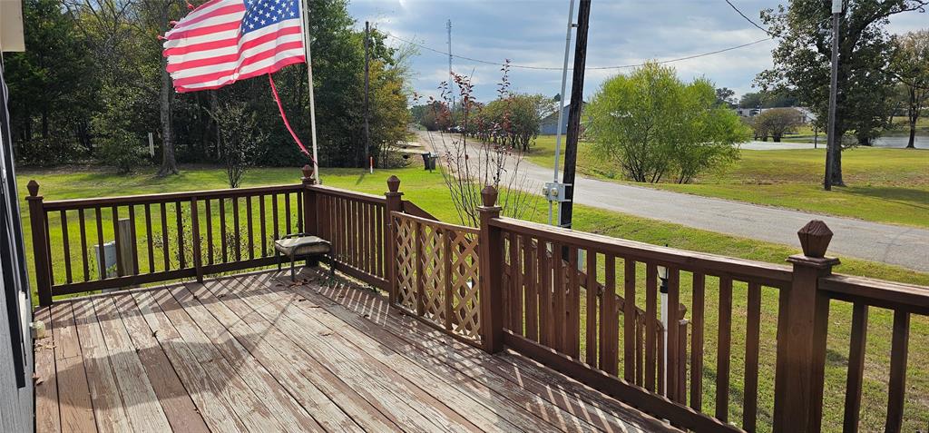 434 Geronimo Quitman, TX 75783 - Photo 2 of 36 a view of a deck with a yard