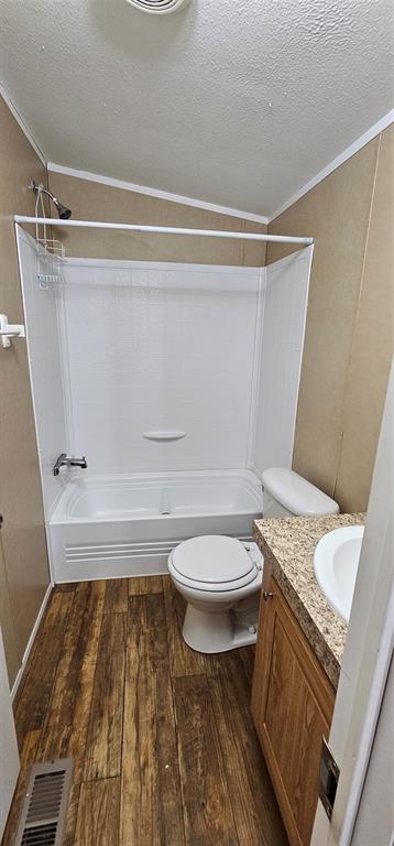 434 Geronimo Quitman, TX 75783 - Photo 27 of 36 a bathroom with a granite countertop toilet and a sink