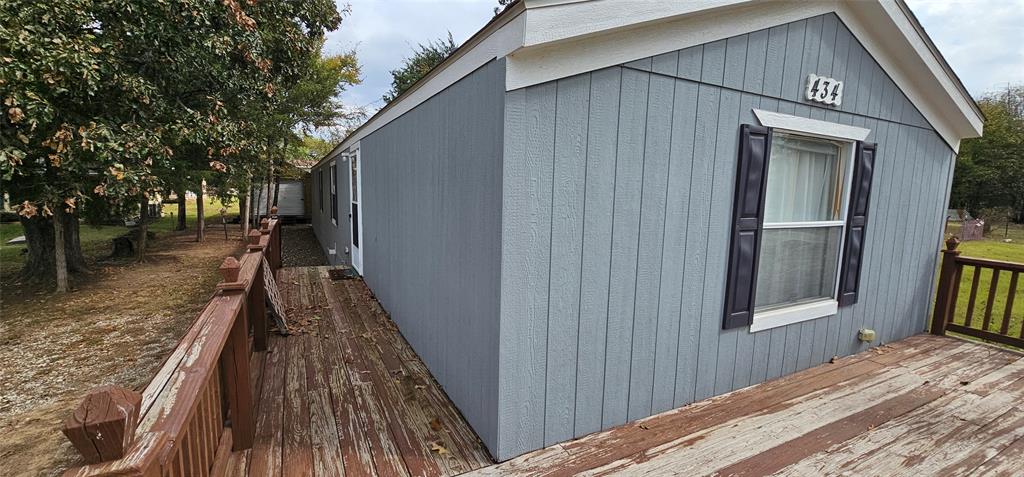 434 Geronimo Quitman, TX 75783 - Photo 3 of 36 a backyard of a house with wooden floor