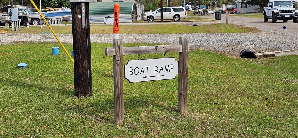 434 Geronimo Quitman, TX 75783 - Photo 32 of 36 a view of a park with welcome board