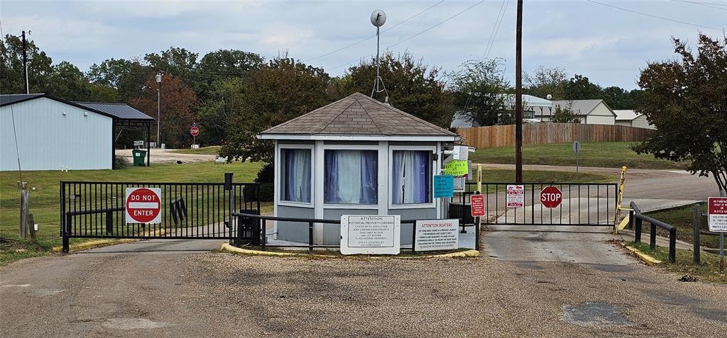 434 Geronimo Quitman, TX 75783 - Photo 36 of 36 a front view of a house with a garage