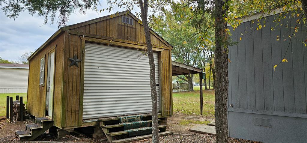434 Geronimo Quitman, TX 75783 - Photo 9 of 36 a view of a house with a yard