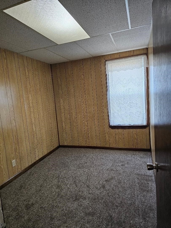 339 Harrison Street, Unit 1N Fall River, MA 02723 - Photo 9 of 14 an empty room with windows
