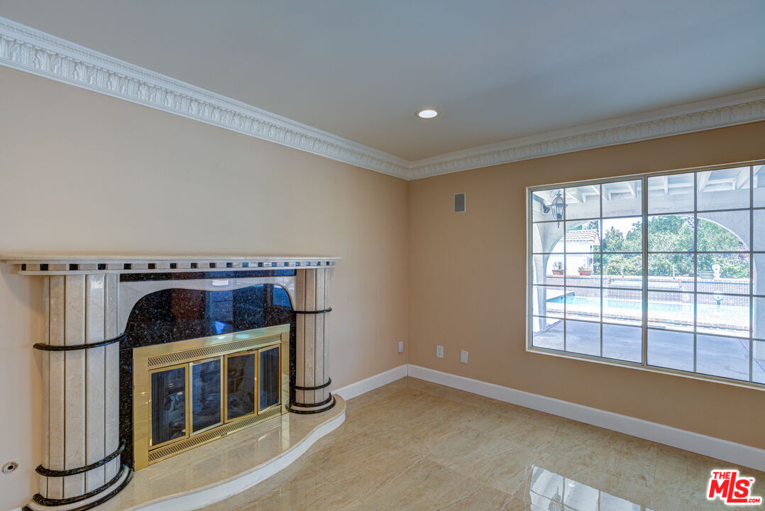 4041 Alonzo Avenue Encino, CA 91316 - Photo 11 of 41 a view of an empty room with a window