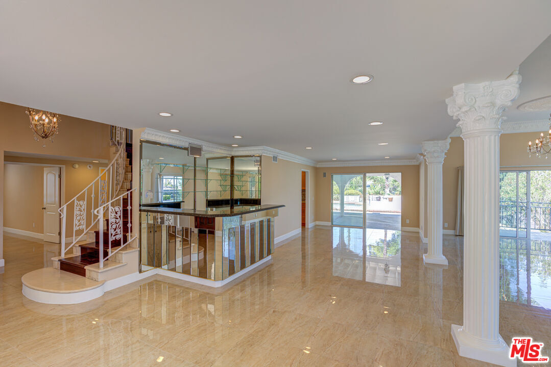 4041 Alonzo Avenue Encino, CA 91316 - Photo 13 of 41 a view of an entryway with wooden floor