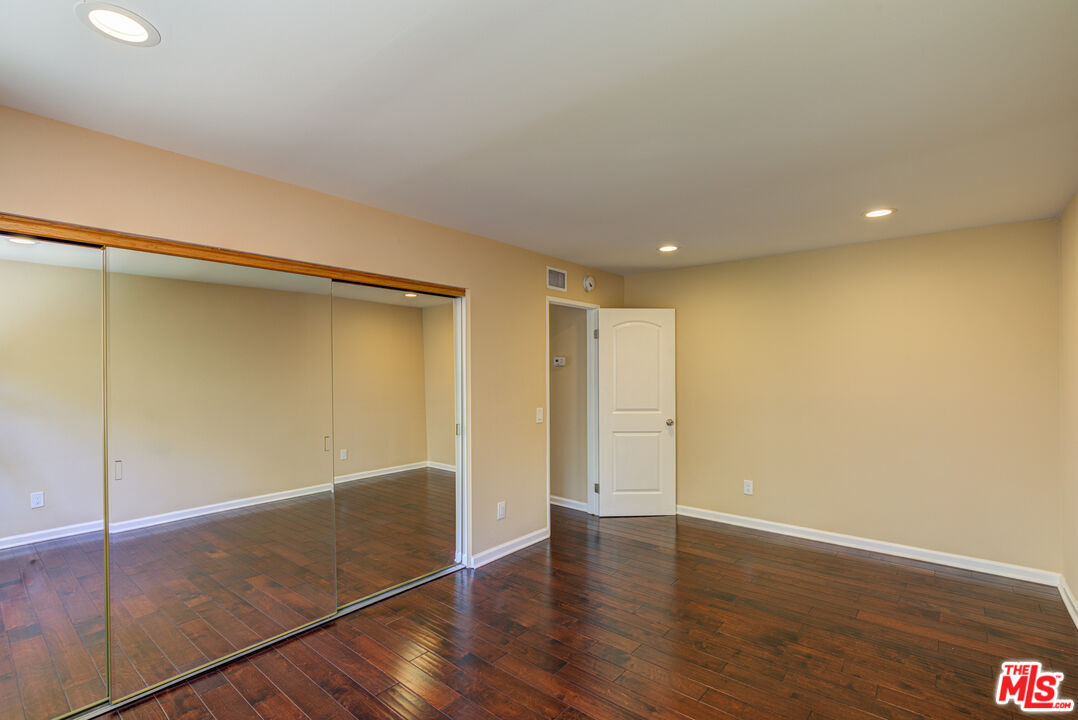 4041 Alonzo Avenue Encino, CA 91316 - Photo 27 of 41 a view of an empty room with wooden floor