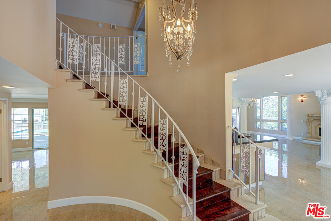 4041 Alonzo Avenue Encino, CA 91316 - Photo 4 of 41 a view of entryway and hall with wooden floor