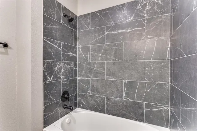 a bathroom with a bathtub