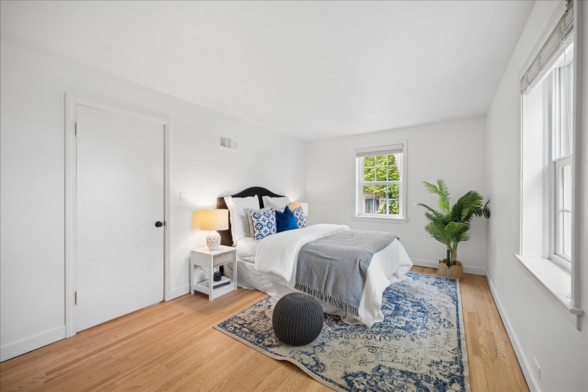 712 Juniper Road Glenview, IL 60025 - Photo 18 of 33 a bed room with a bed and a window