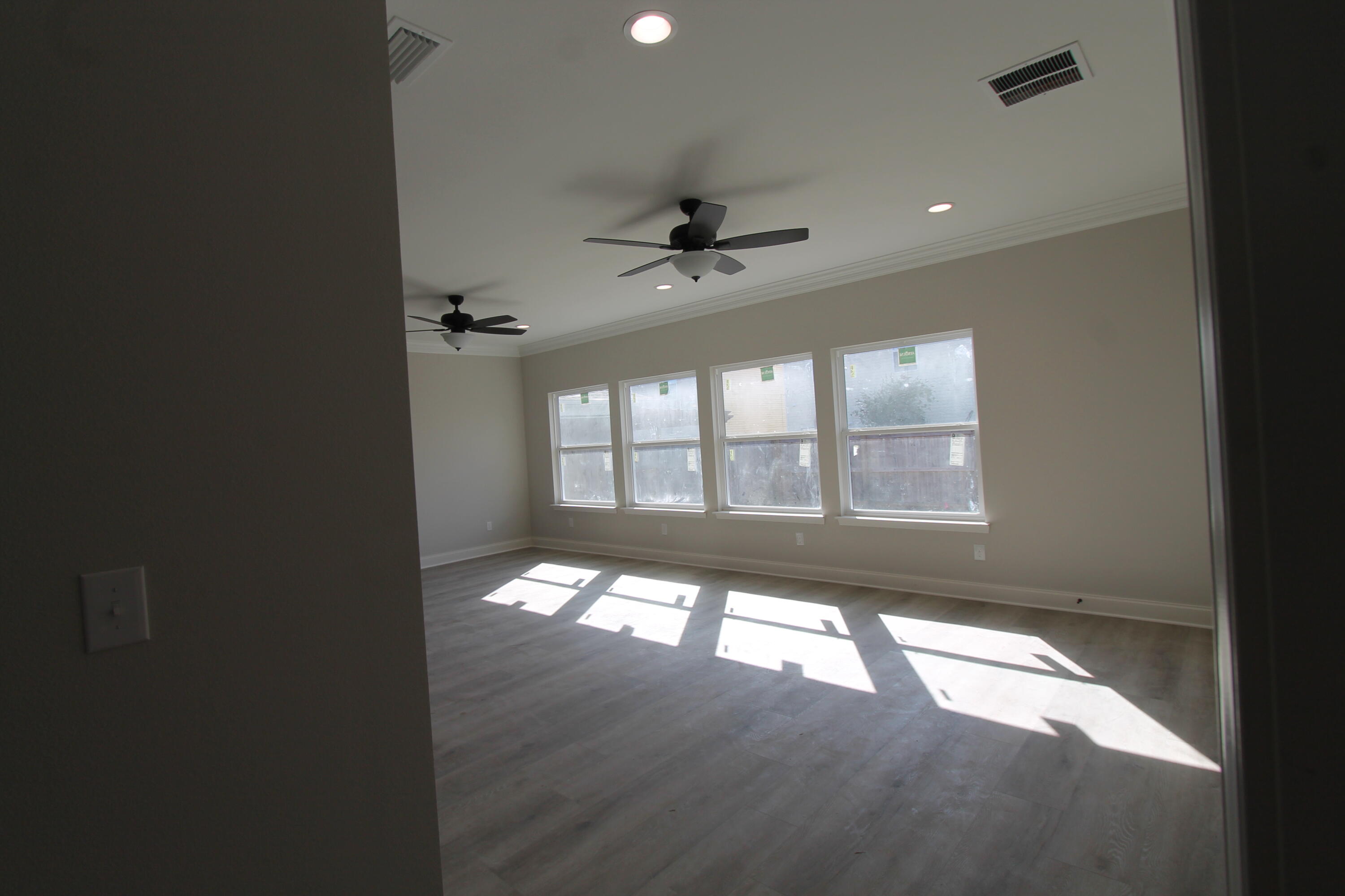 2135 Nina Street Navarre, FL 32566 - Photo 2 of 7 a view of an empty room with a window