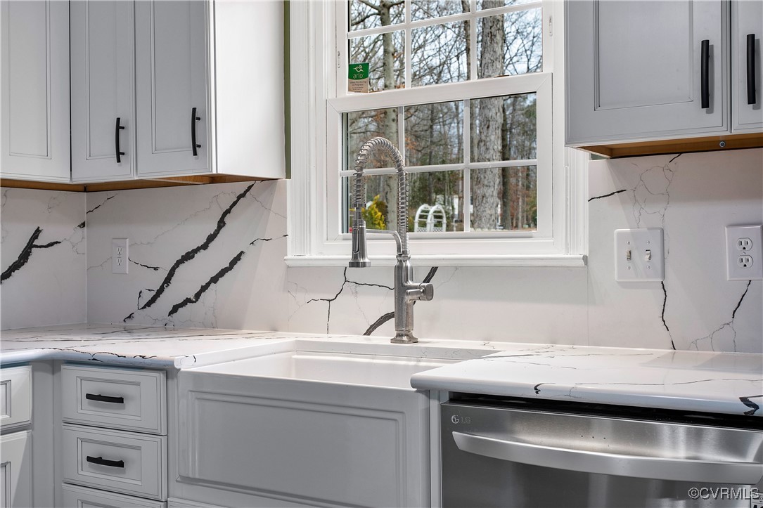 1325 Unison Drive Midlothian, VA 23113 - Photo 13 of 32 a kitchen with a sink and a window