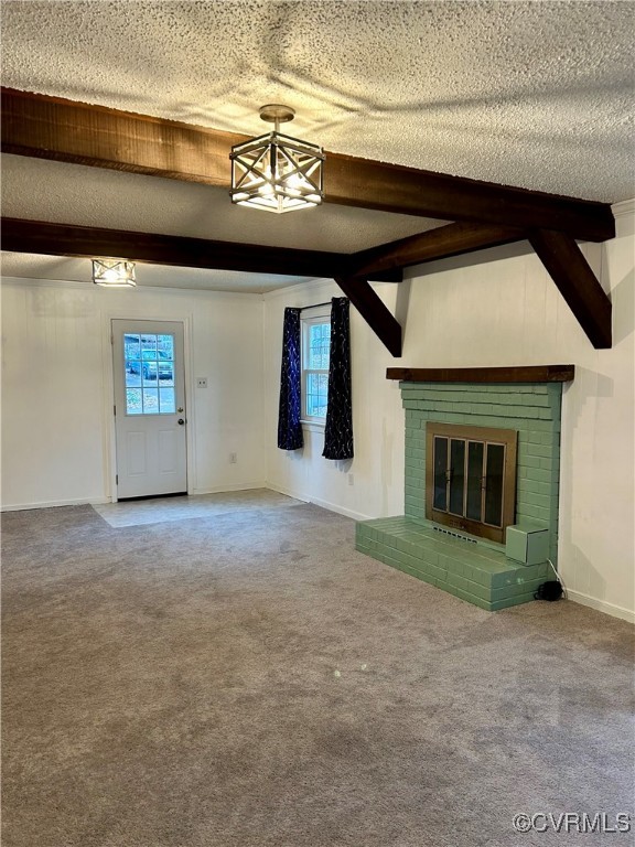1325 Unison Drive Midlothian, VA 23113 - Photo 18 of 32 a view of an empty room with a fireplace and chandelier