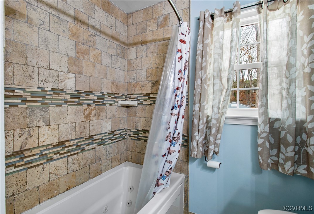 1325 Unison Drive Midlothian, VA 23113 - Photo 25 of 32 a bathroom with a bathtub and shower