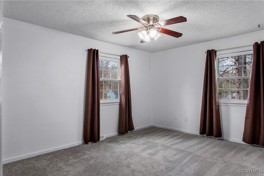 1325 Unison Drive Midlothian, VA 23113 - Photo 26 of 32 an empty room with windows and closet
