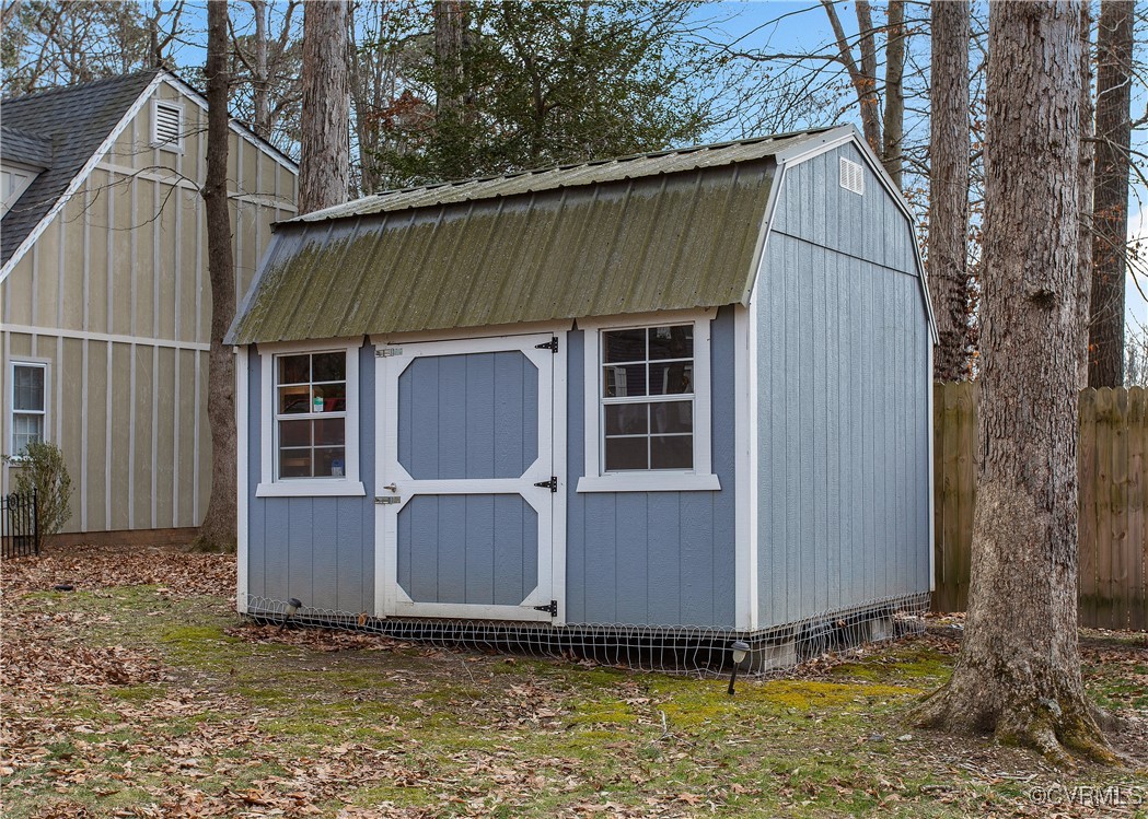 1325 Unison Drive Midlothian, VA 23113 - Photo 31 of 32 a front view of a house with a yard