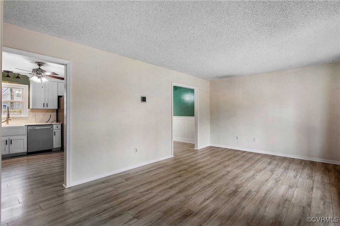 1325 Unison Drive Midlothian, VA 23113 - Photo 8 of 32 a view of a kitchen with a sink and a stove top oven