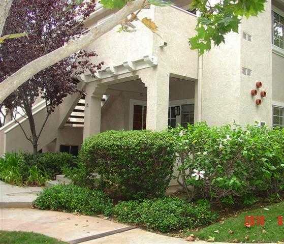 46 Via Prado Rancho Santa Margarita, CA 92688 - Photo 1 of 1 a front view of a house with a yard