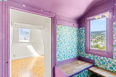 a view of a room that has a window