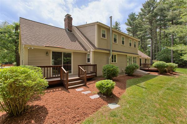 31 Bayberry Road Groton, MA 01450 - Photo 3 of 15 a front view of house with yard outdoor seating and green space