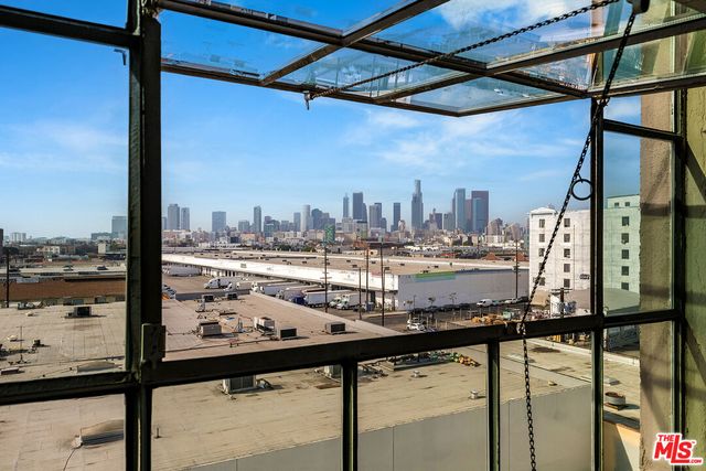 a view of a building with sitting area