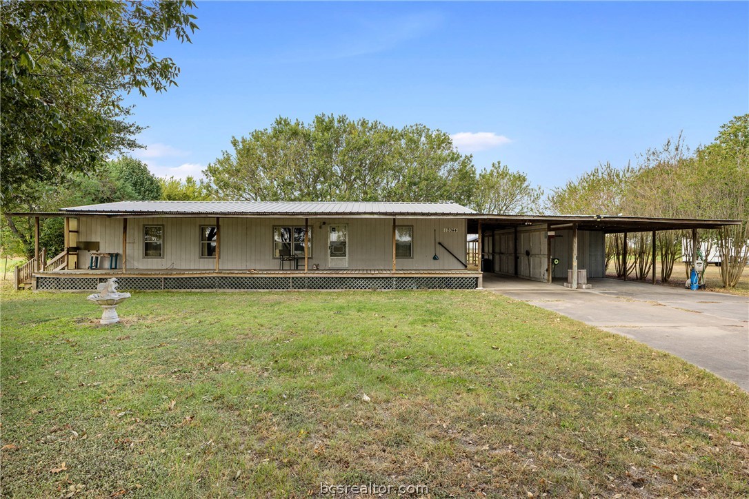 12044 Fm 2155 Somerville, TX 77879 - Photo 16 of 16 a view of house with backyard space and balcony