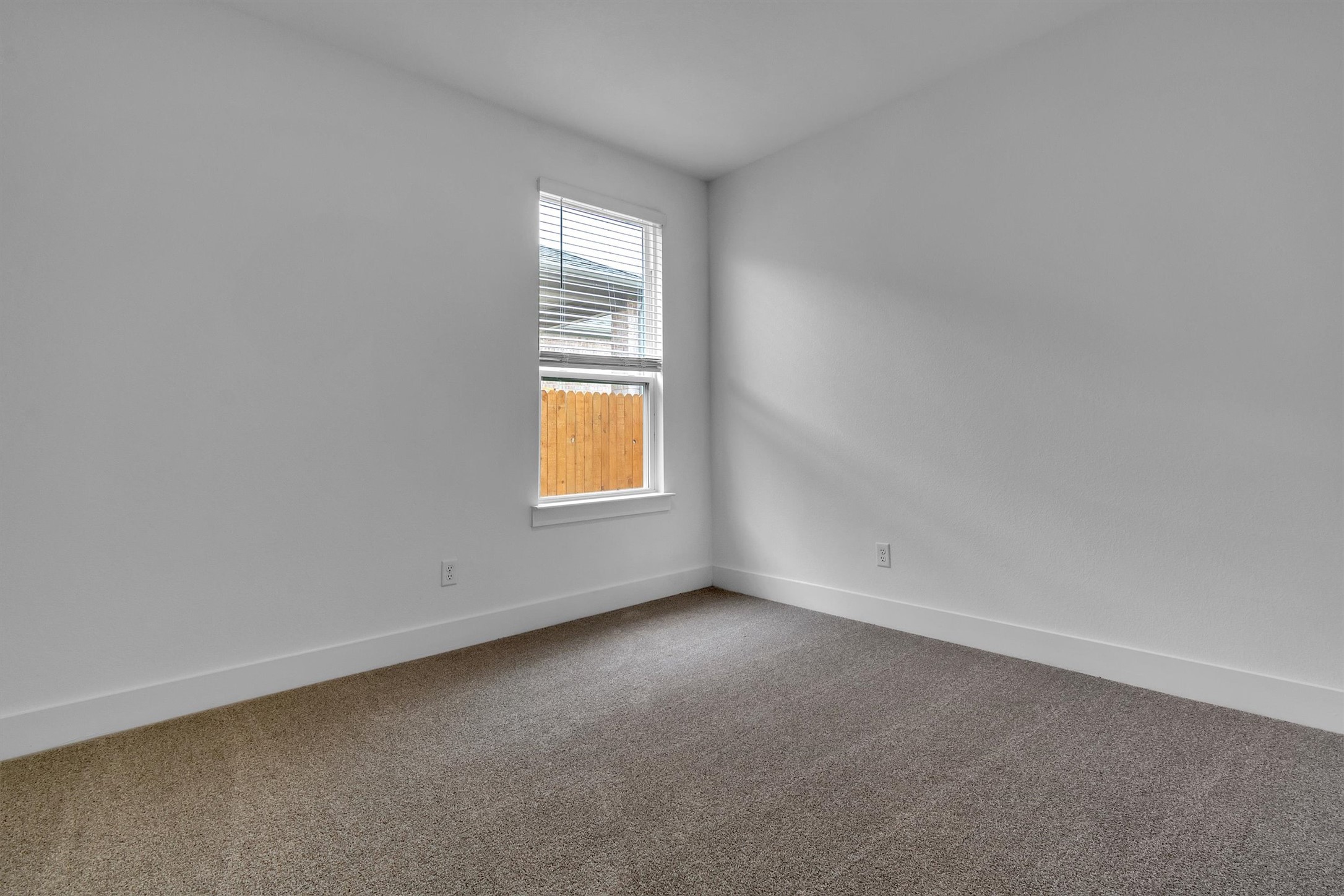 368 Bridge Deck Loop Kyle, TX 78640 - Photo 22 of 40 Unfurnished room with dark carpet and baseboards