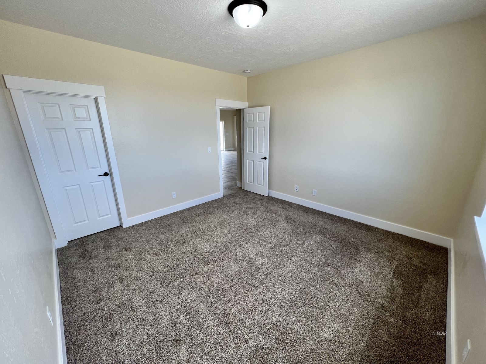 200 Ridgeway Drive Spring Creek, NV 89815 - Photo 22 of 34 a view of an empty room and wooden floor