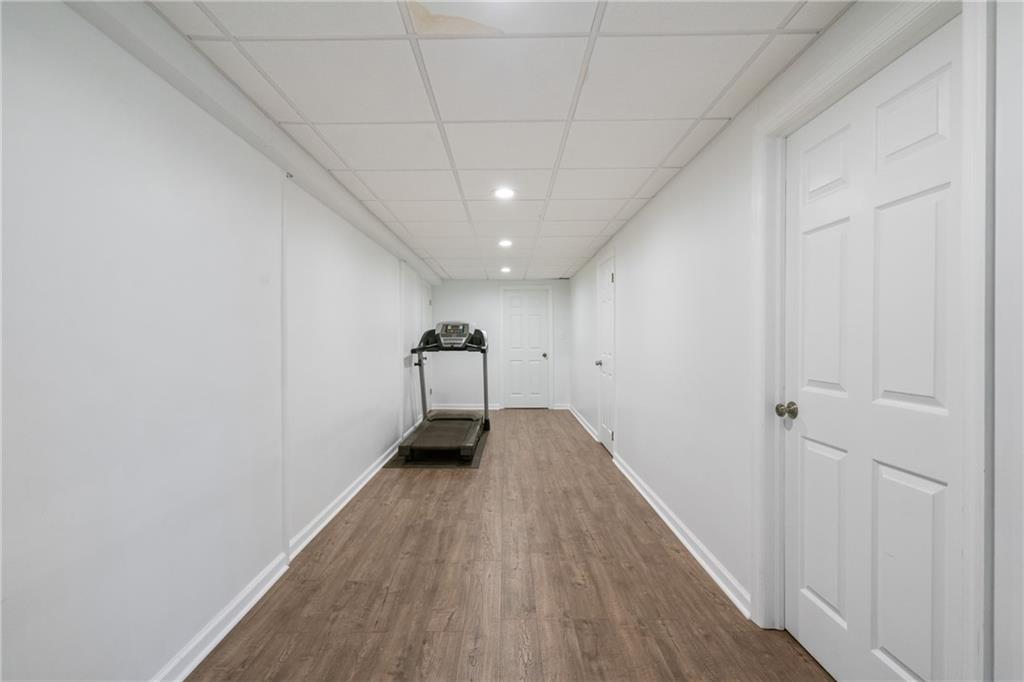 212 Field Club Road Pittsburgh, PA 15238 - Photo 22 of 27 LL hallway to full bath and storage rooms