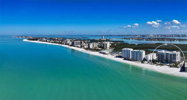 a view of a swimming pool with an outdoor space and seating area