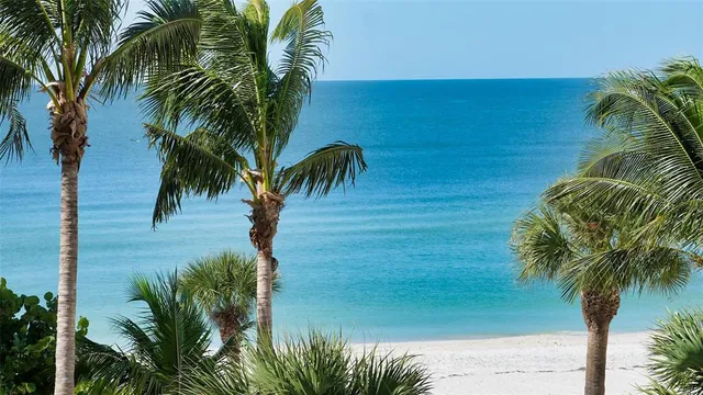 a bathroom with a toilet a sink and a mirror