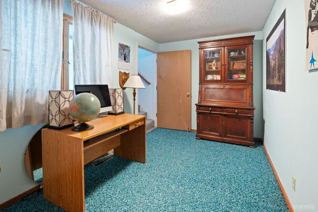 a room with furniture and a window