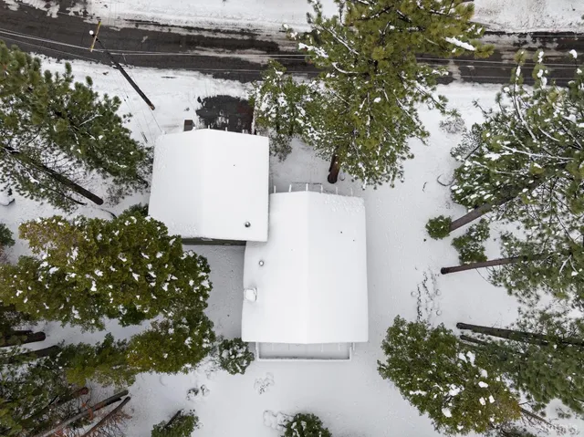 a view of a house with a tree