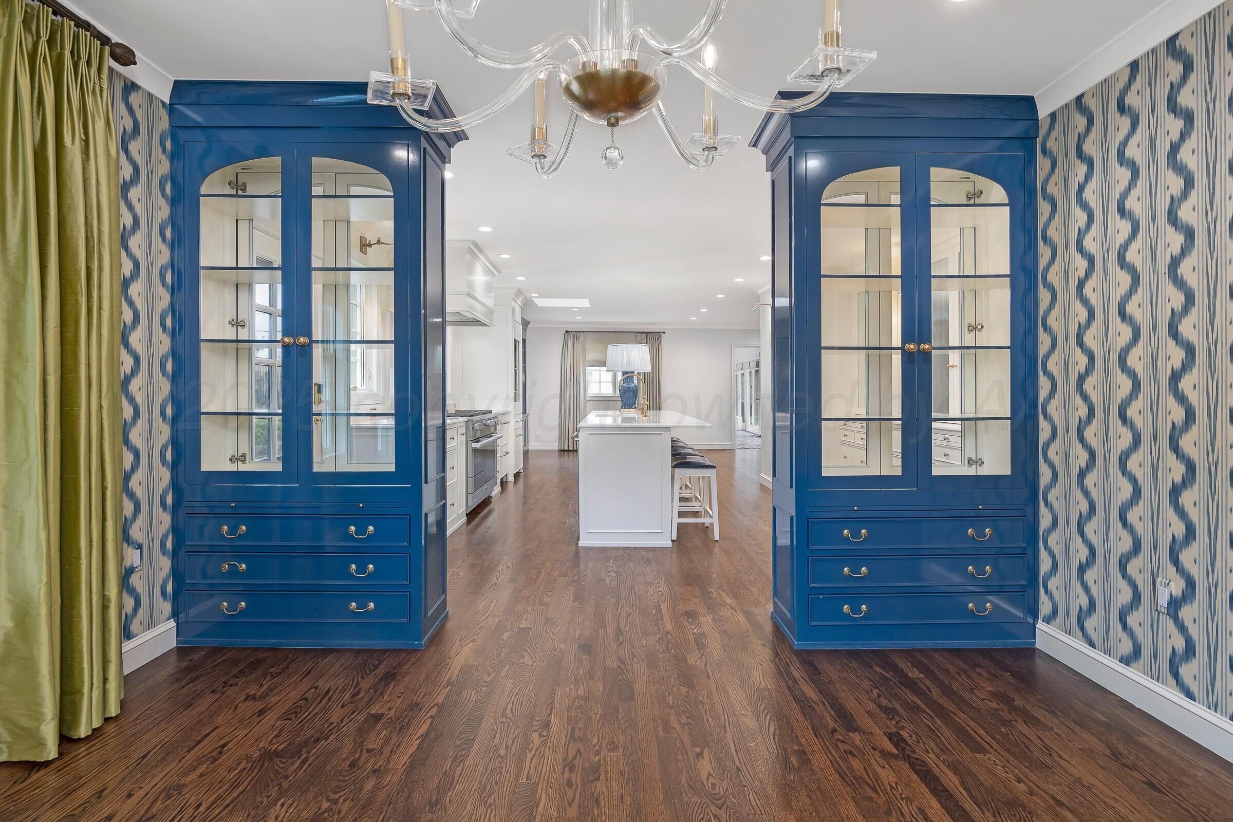 3003 South Hughes Street Amarillo, TX 79109 - Photo 12 of 76 a room with a dresser and a window
