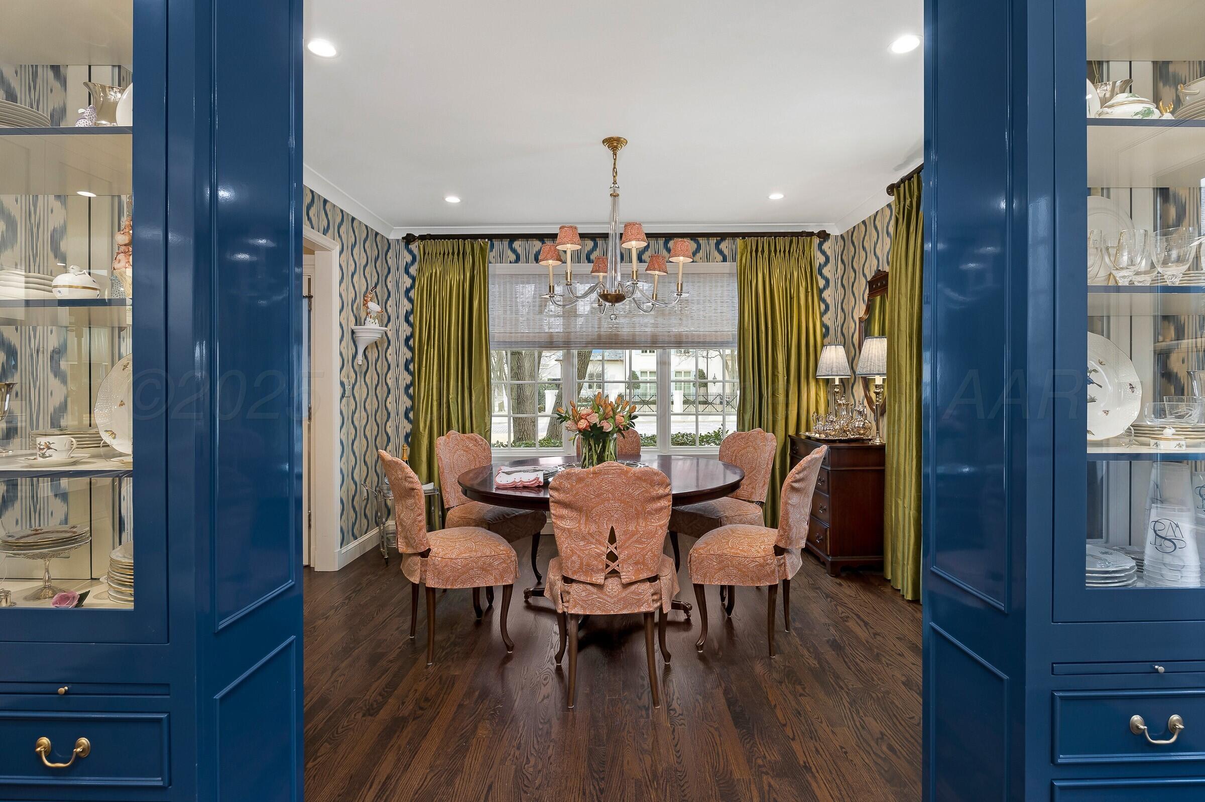 3003 South Hughes Street Amarillo, TX 79109 - Photo 13 of 76 a dining room with furniture window and wooden floor