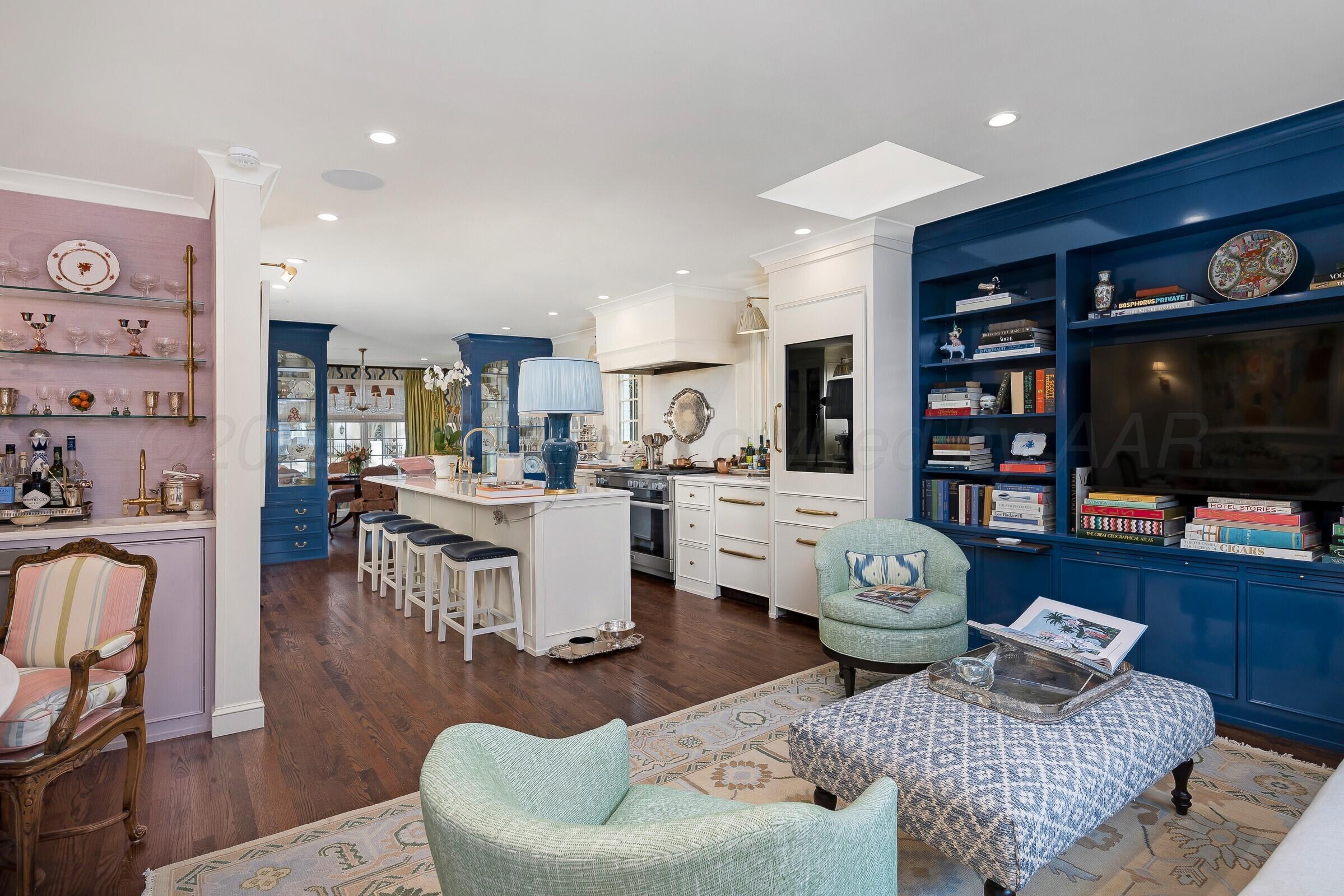 3003 South Hughes Street Amarillo, TX 79109 - Photo 17 of 76 a living room with fireplace furniture and a flat screen tv