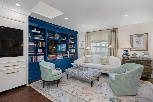 a view of kitchen with furniture and wooden floor