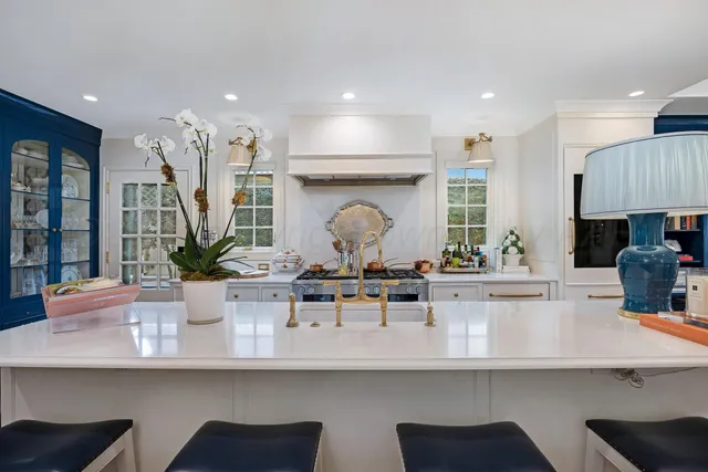 a view of a hallway with wooden floor and entryway