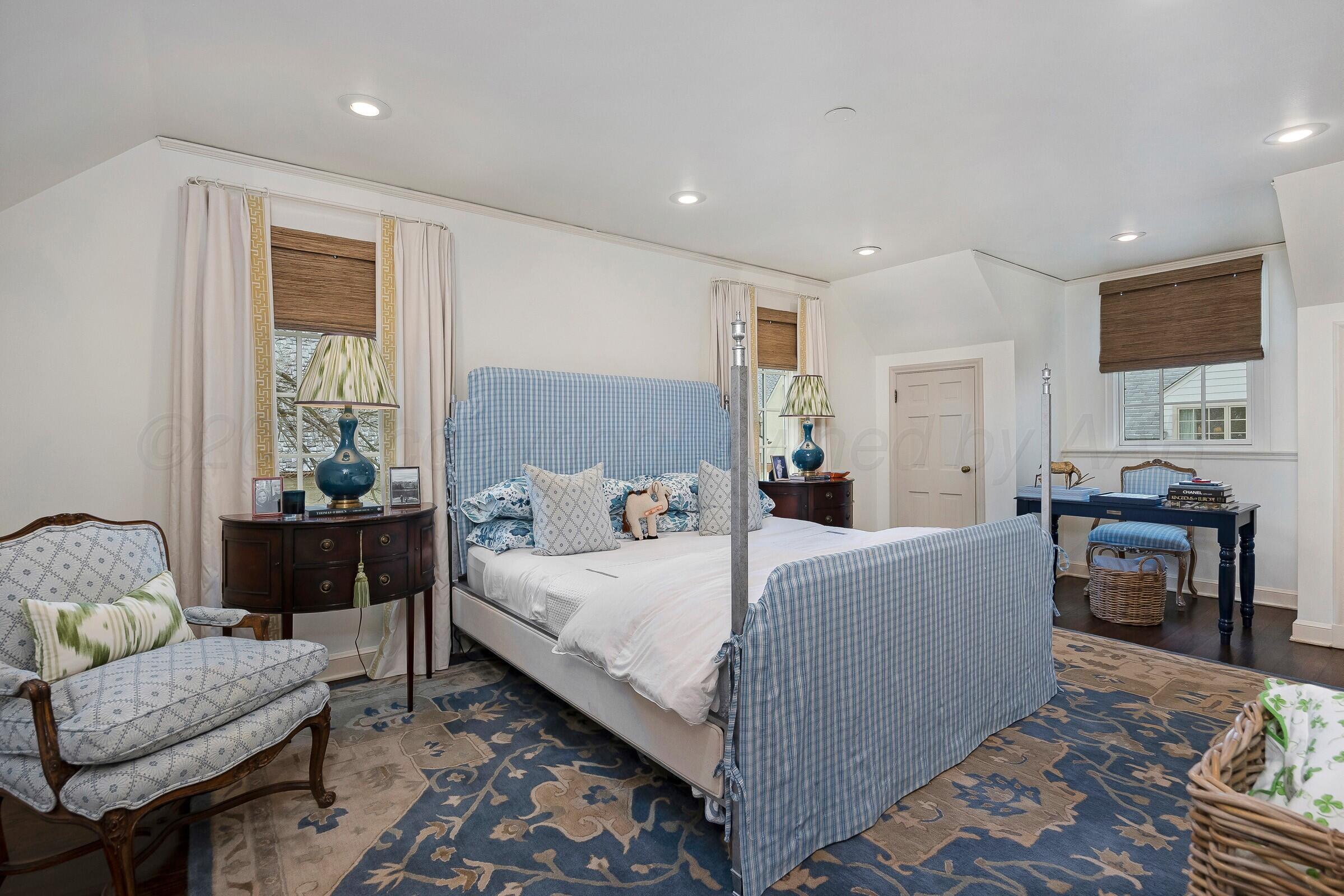 3003 South Hughes Street Amarillo, TX 79109 - Photo 53 of 76 a bedroom with a bed and a couch